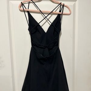 Lulus little black dress with cross strap back. Size small. Worn once like new.